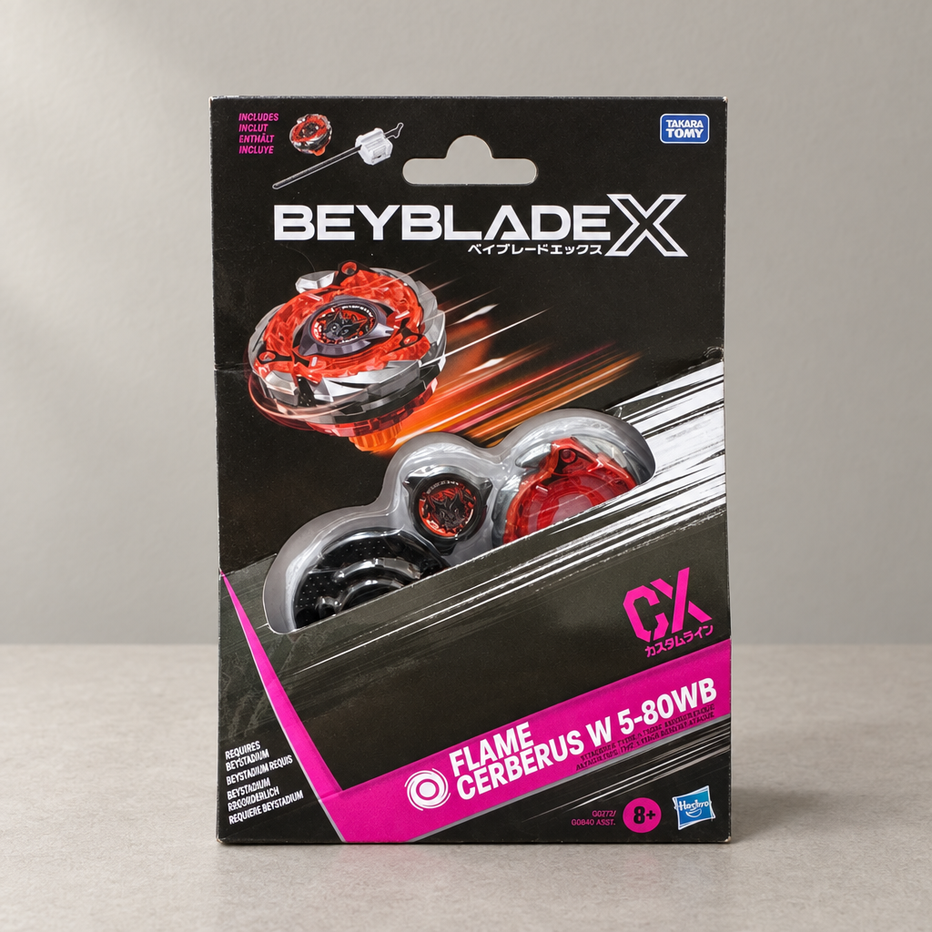 Confezione Beyblade X Flame Cerberus W 5-80WB Hasbro appoggiata su un piano chiaro